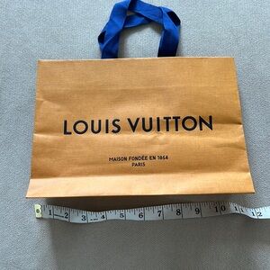 100% authentic Louis Vuitton shopping bag
